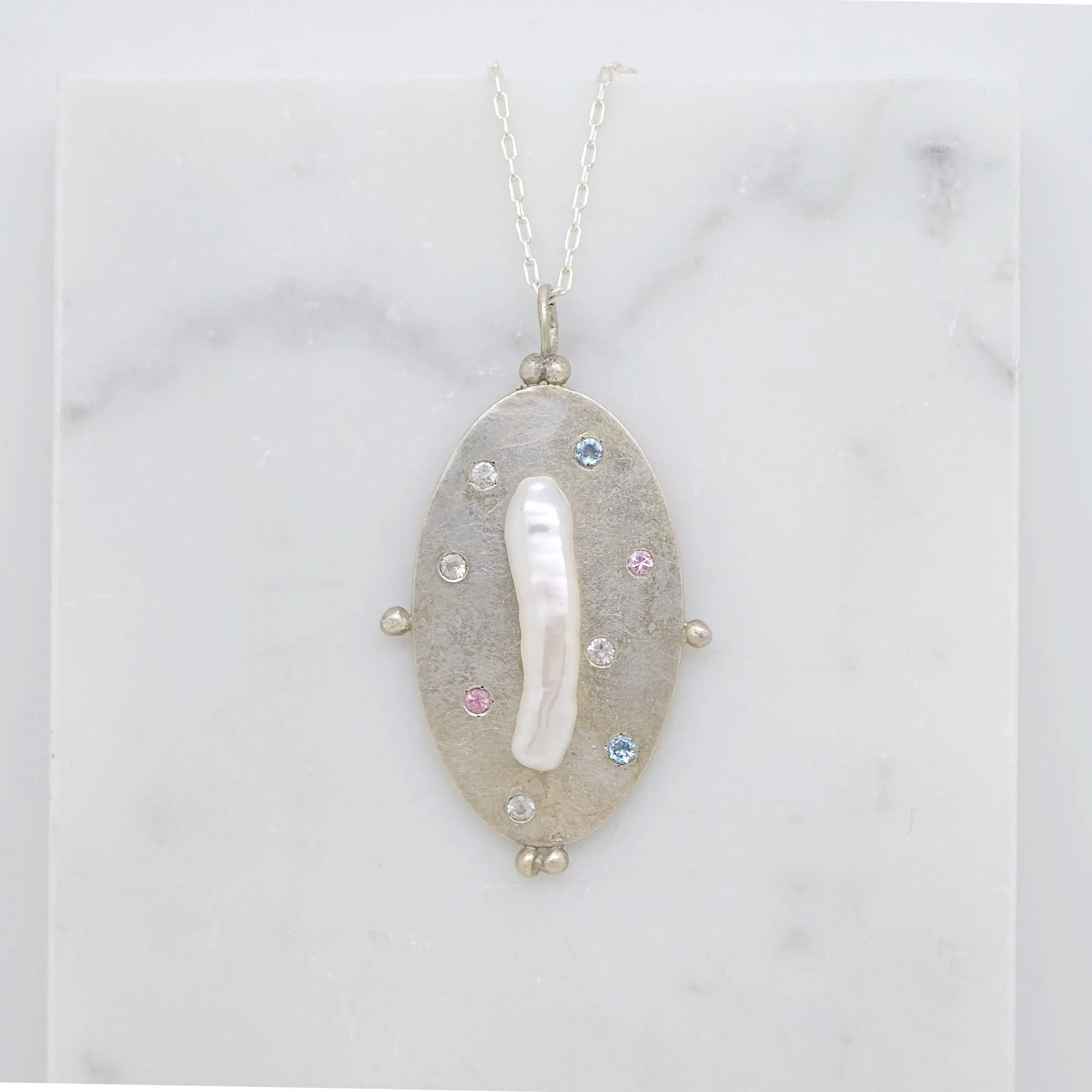 Art pendant necklace with keshi pearl and sapphires