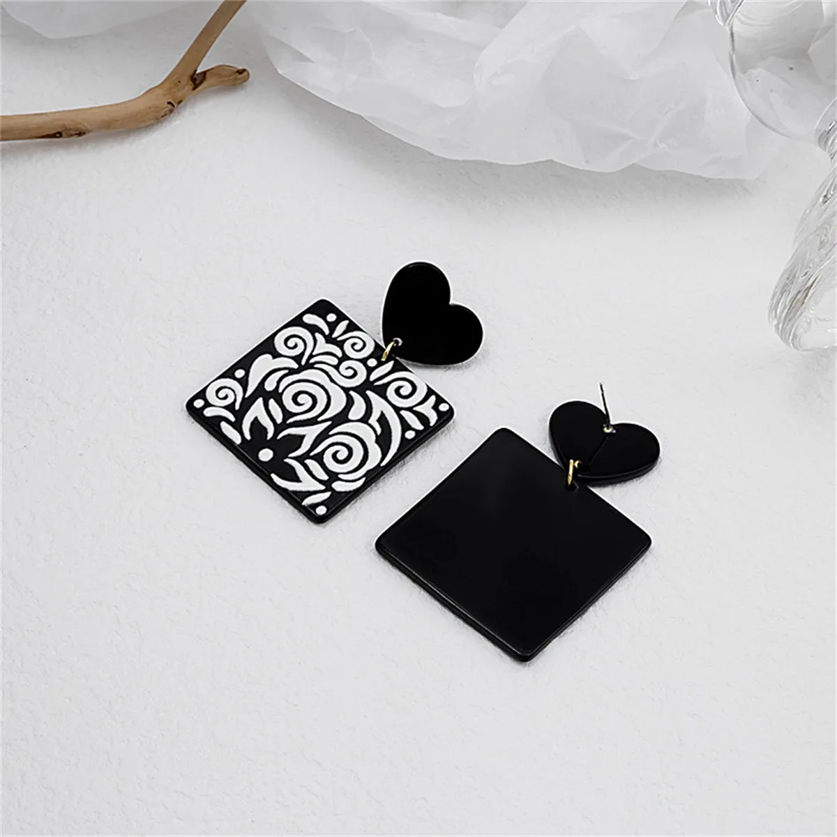Black Acrylic Heart Swirl Earrings