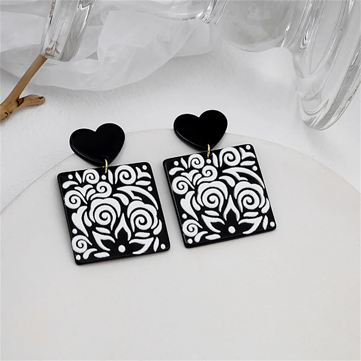 Black Acrylic Heart Swirl Earrings