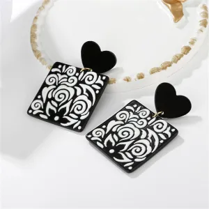Black Acrylic Heart Swirl Earrings