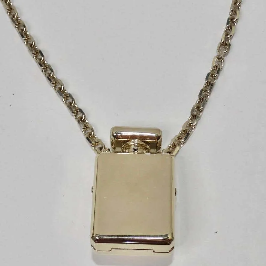 Chanel CC Gold Tone Perfume Bottle Locket Necklace