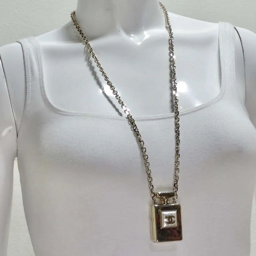 Chanel CC Gold Tone Perfume Bottle Locket Necklace