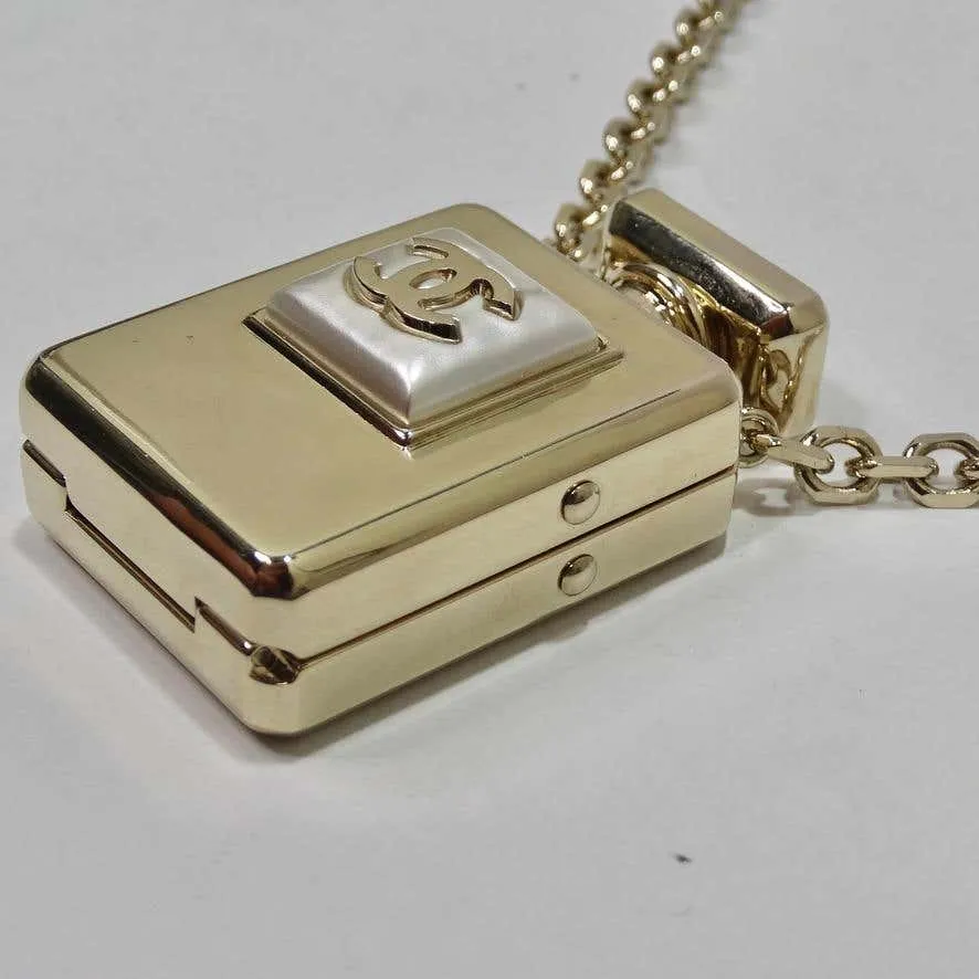 Chanel CC Gold Tone Perfume Bottle Locket Necklace