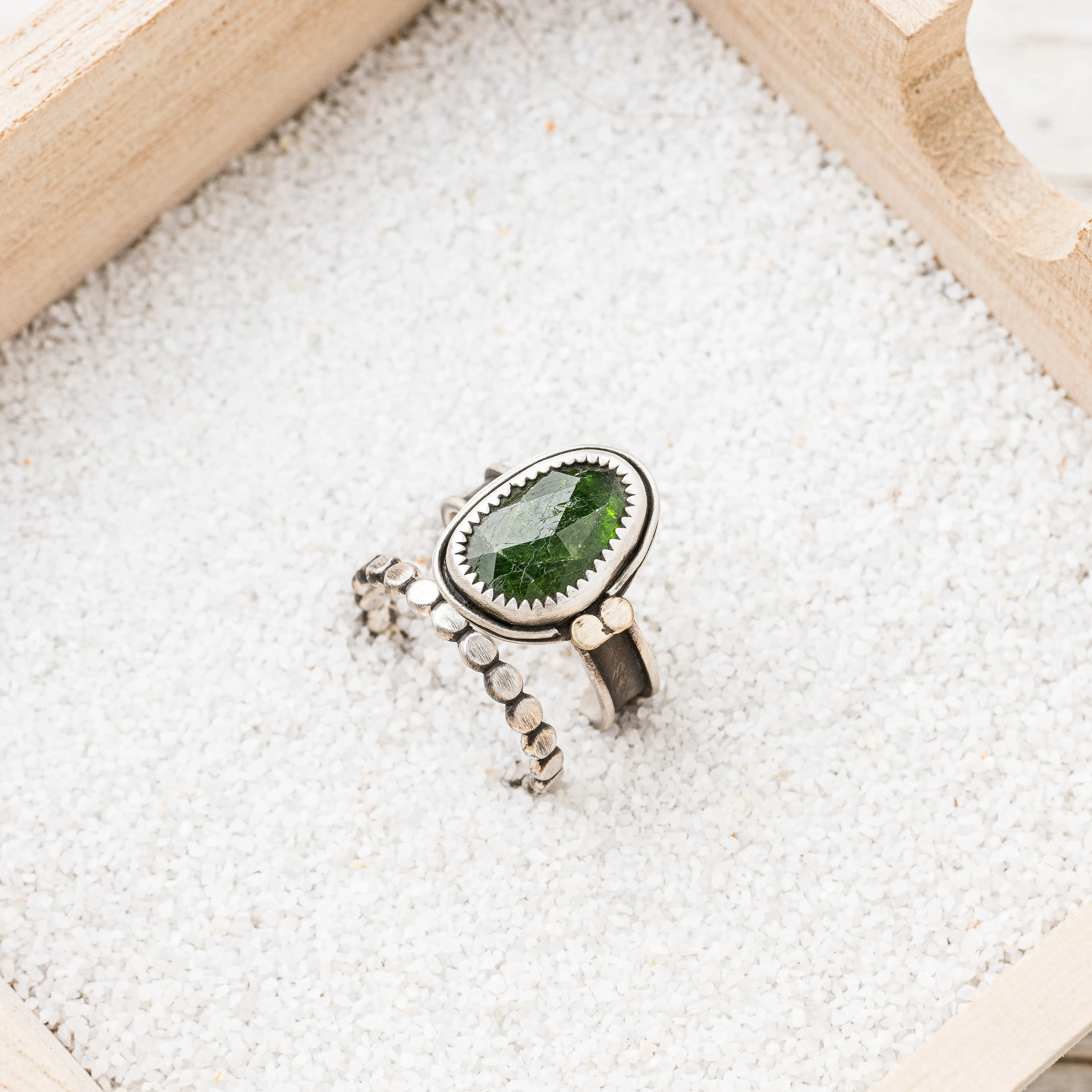 Chrome Diopside Ring with Bronze Discs on Channel Band