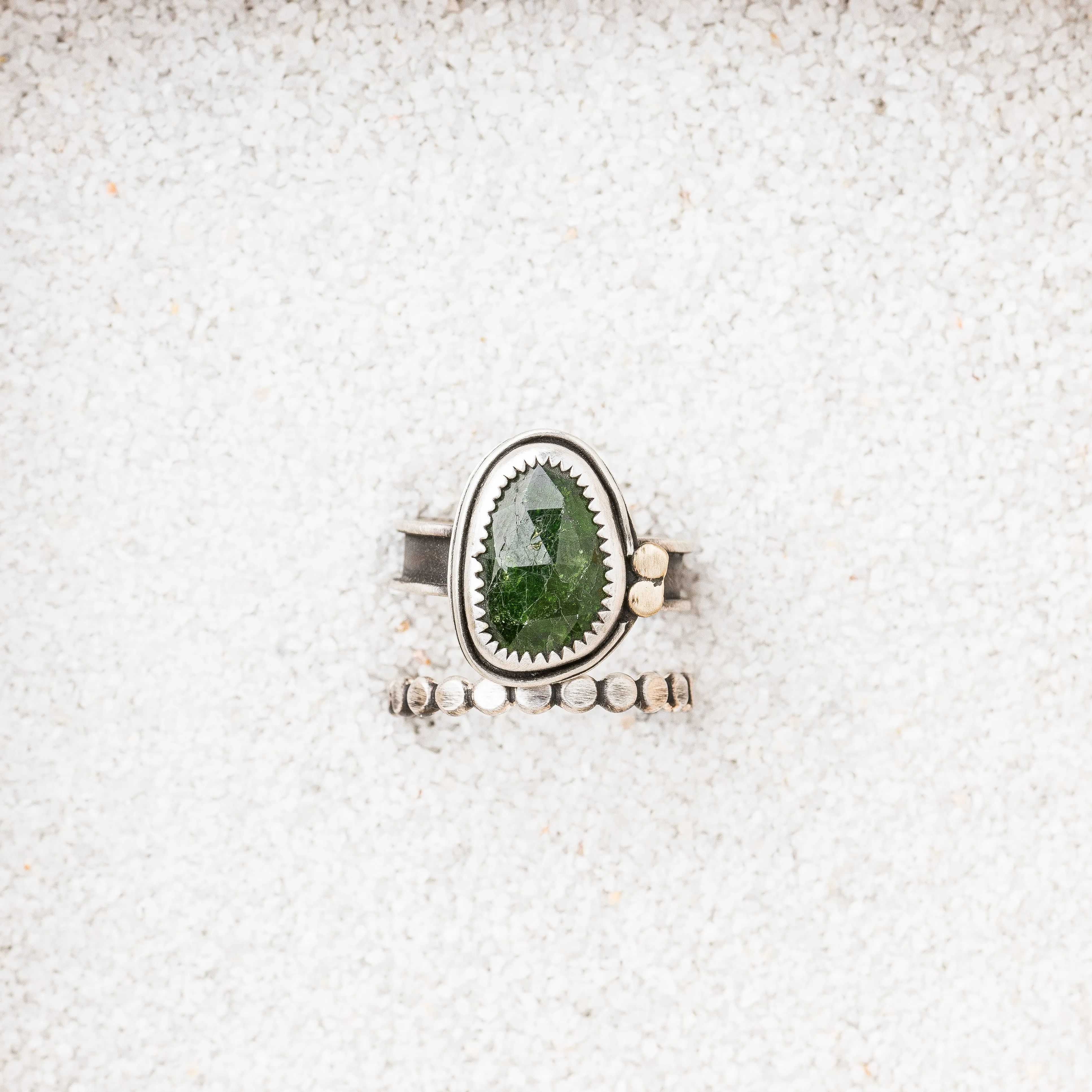 Chrome Diopside Ring with Bronze Discs on Channel Band