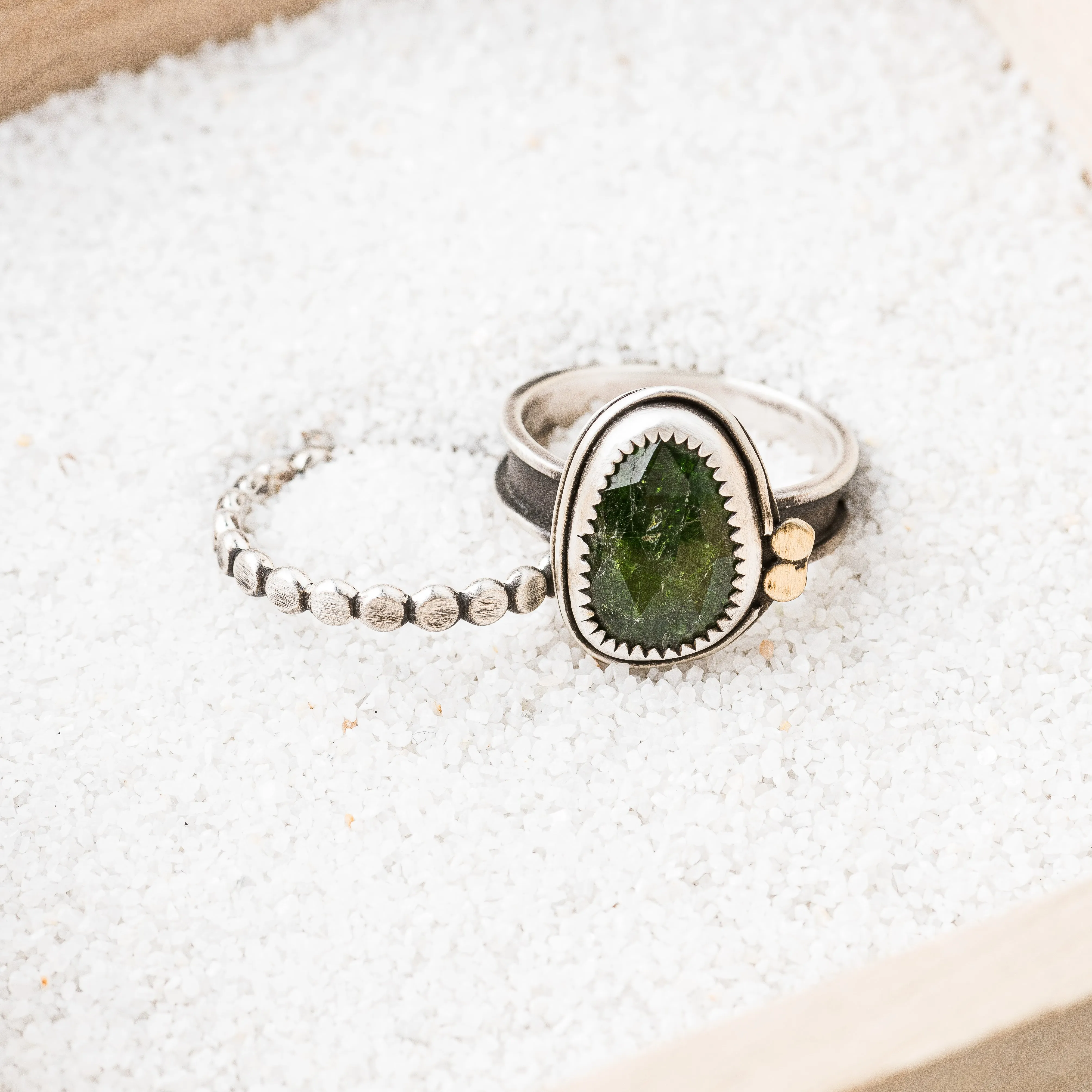 Chrome Diopside Ring with Bronze Discs on Channel Band