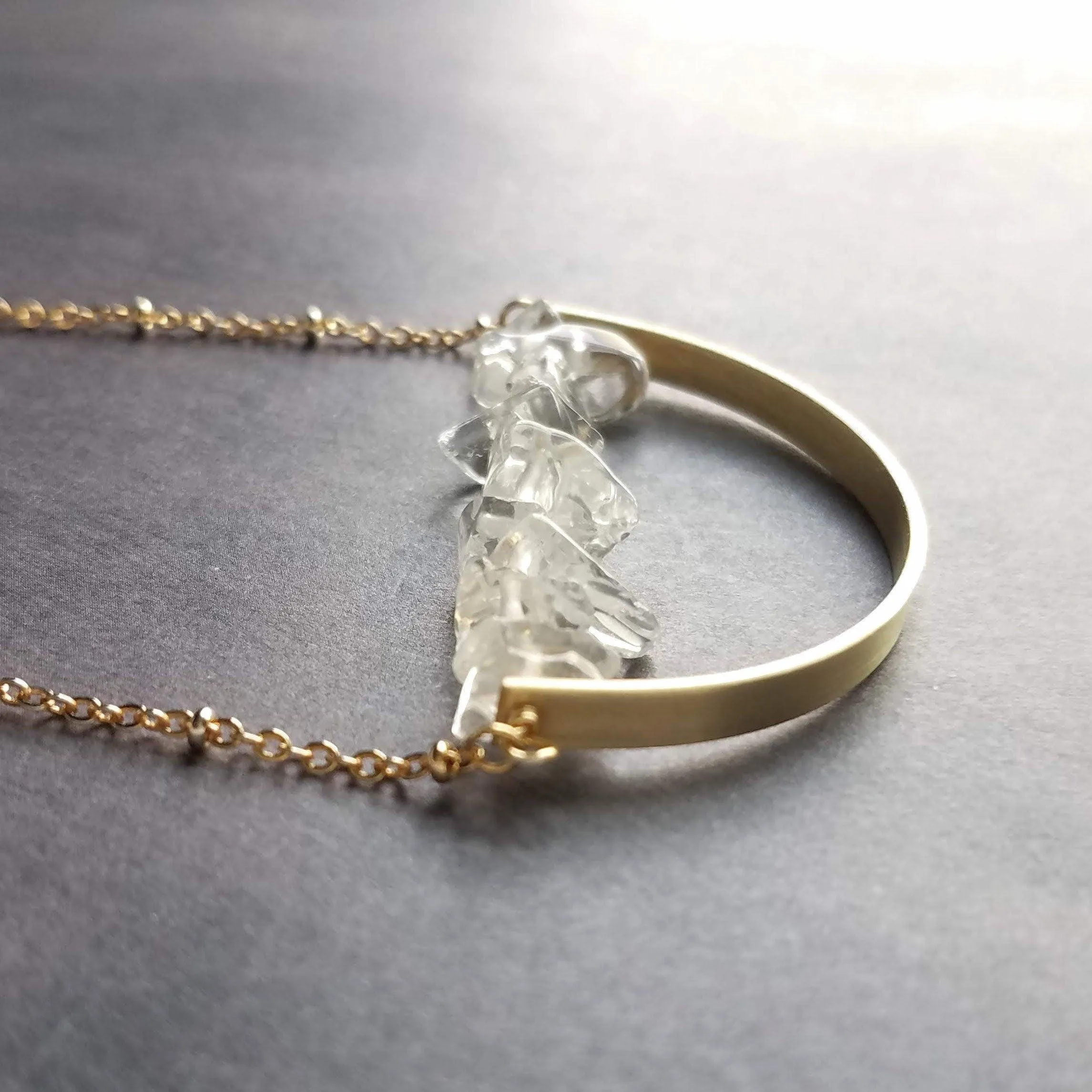 Crystal Necklace, clear quartz crystal pendant, stone pebble pendant, stone chip necklace, gold semicircle pendant, energy chakra long chain