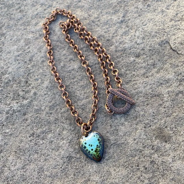 Enamel leaf pendant necklace on copper chain