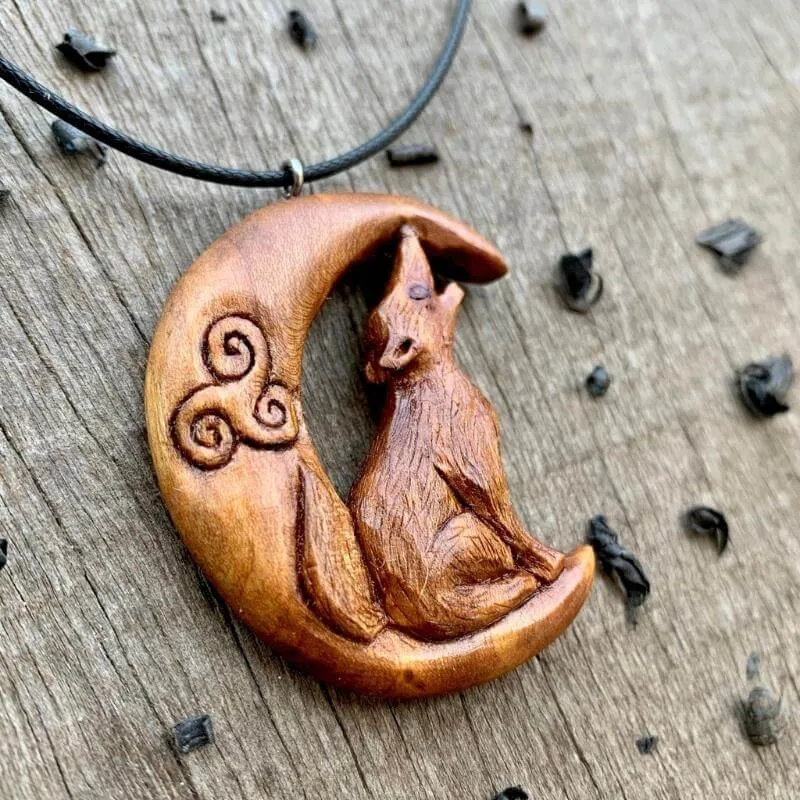 Handcarved Unique Plum Wood Celtic Wolf on Moon Pendant