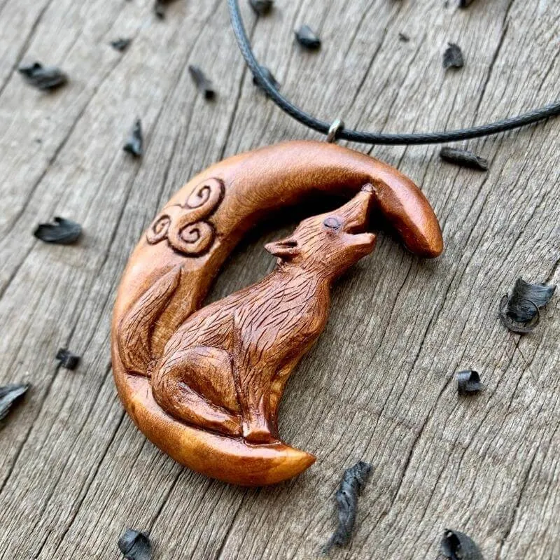 Handcarved Unique Plum Wood Celtic Wolf on Moon Pendant