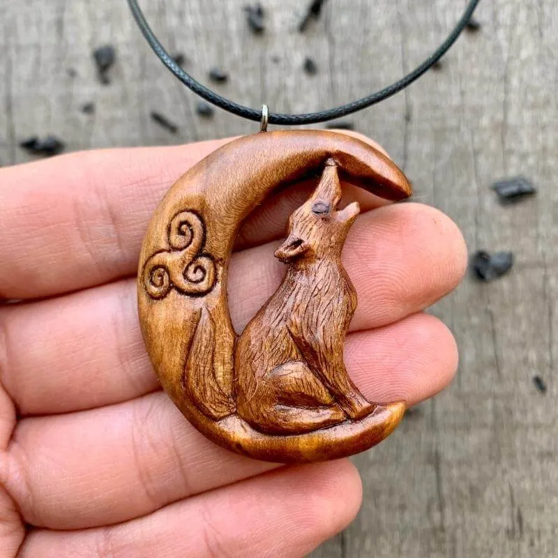 Handcarved Unique Plum Wood Celtic Wolf on Moon Pendant