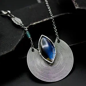 Marqiuse cabochon labradorite pendant necklace with silver circle in spiral design on sterling silver chain