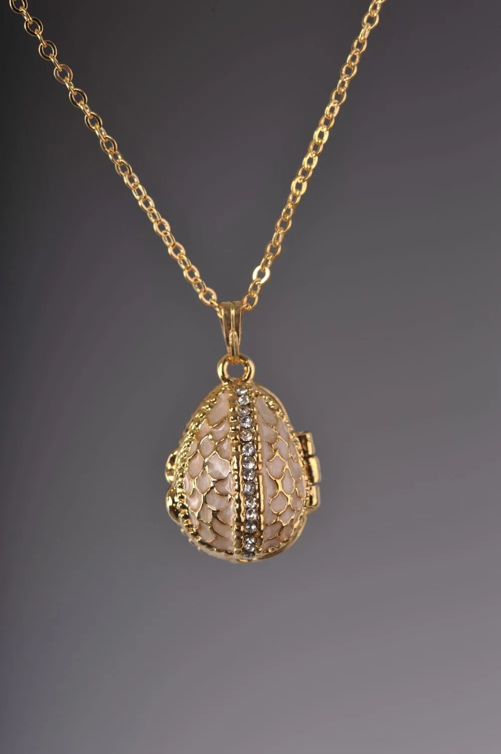 Moccasin Egg Pendant with a Beetle