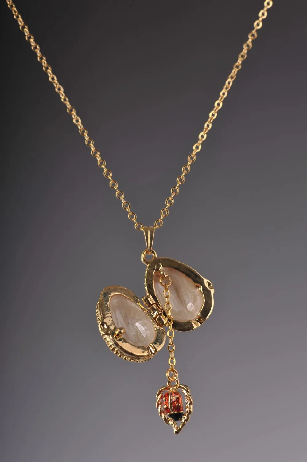 Moccasin Egg Pendant with a Beetle