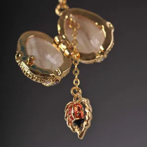 Moccasin Egg Pendant with a Beetle