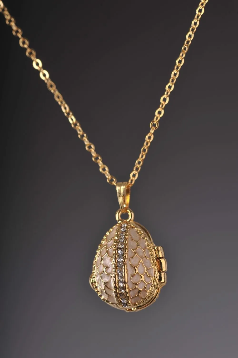 Moccasin Egg Pendant with a Beetle