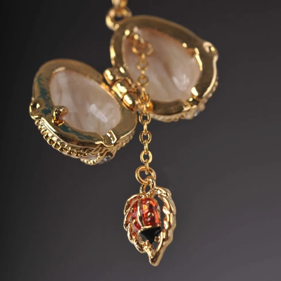 Moccasin Egg Pendant with a Beetle