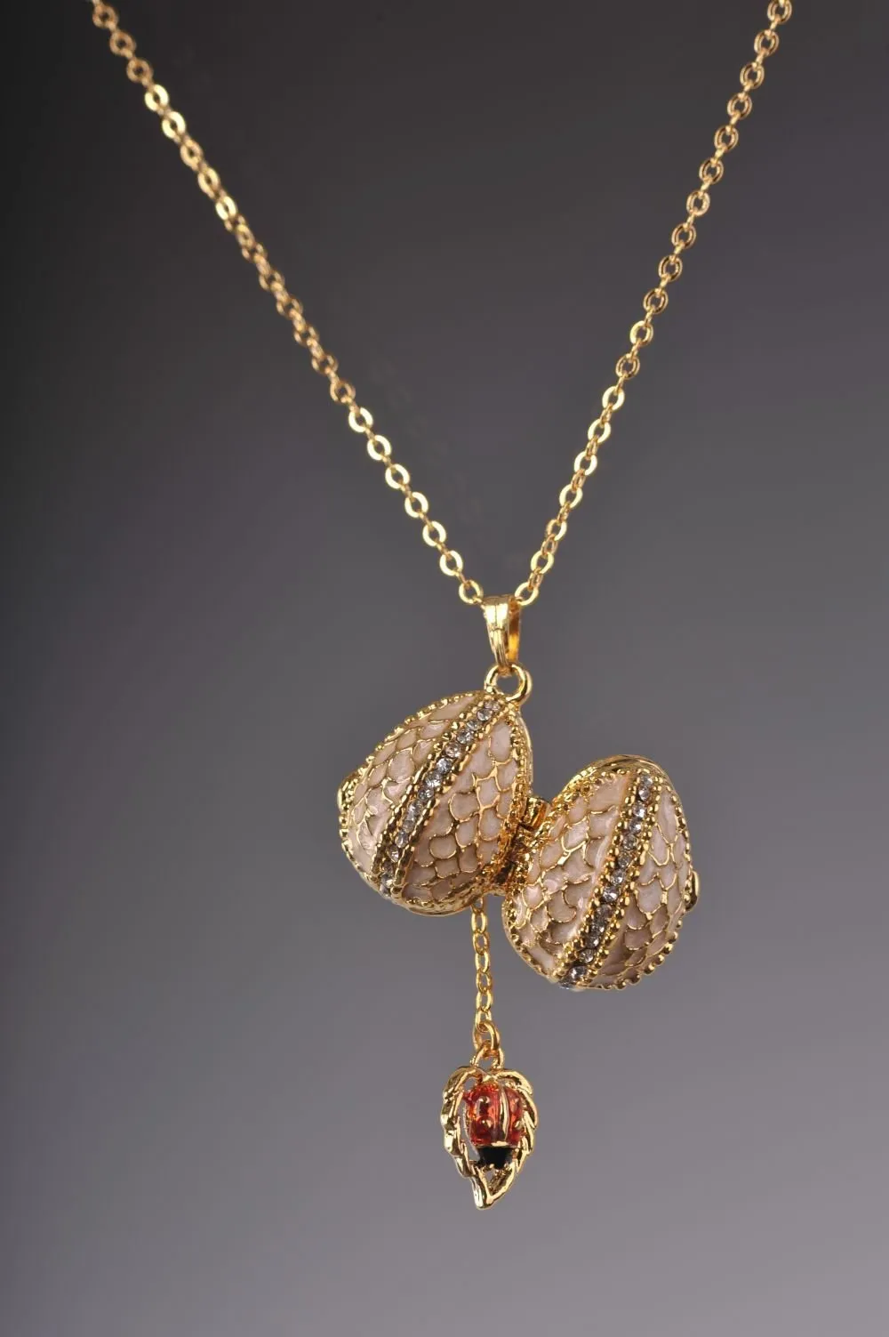 Moccasin Egg Pendant with a Beetle