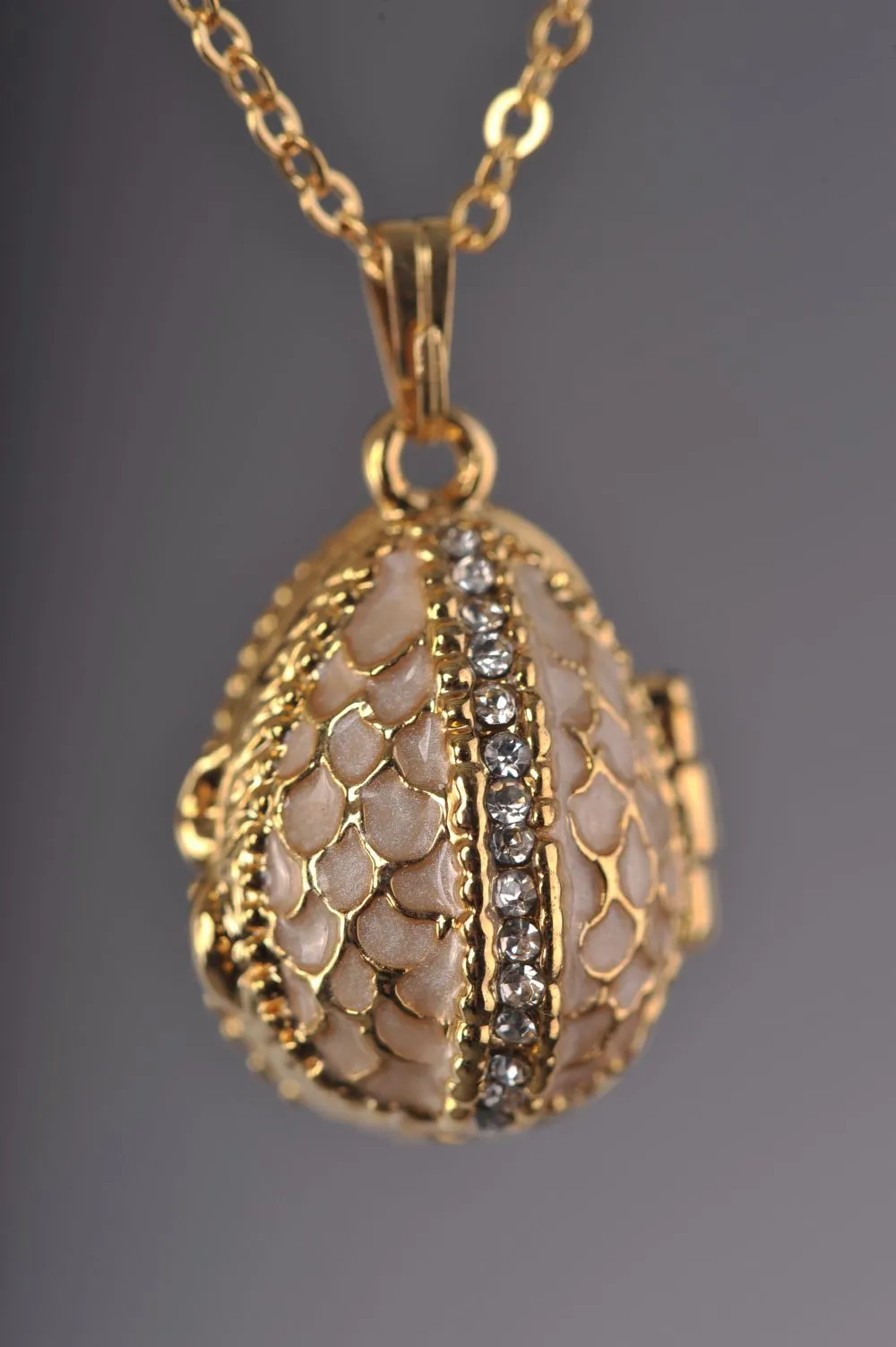 Moccasin Egg Pendant with a Beetle