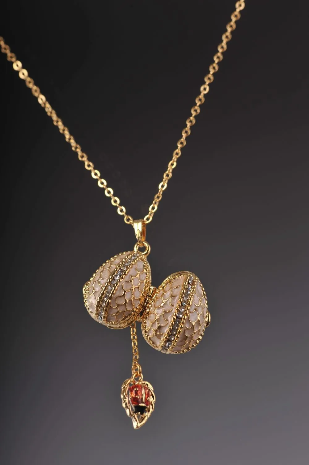 Moccasin Egg Pendant with a Beetle