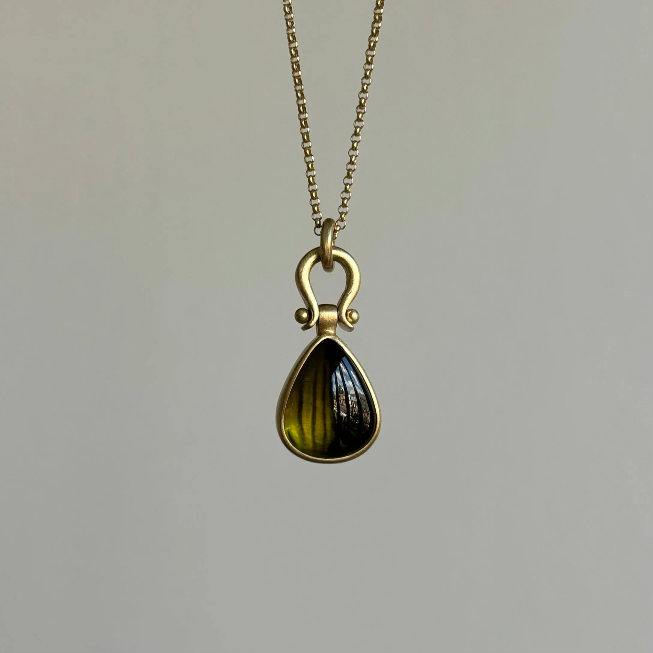 Olive Tourmaline Cabochon Drop Pendant with Lyre Bail