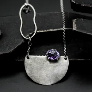 Oval Amethyst pendant necklace in silver bezel and prongs setting with silver semi-circle shape on sterling silver chain