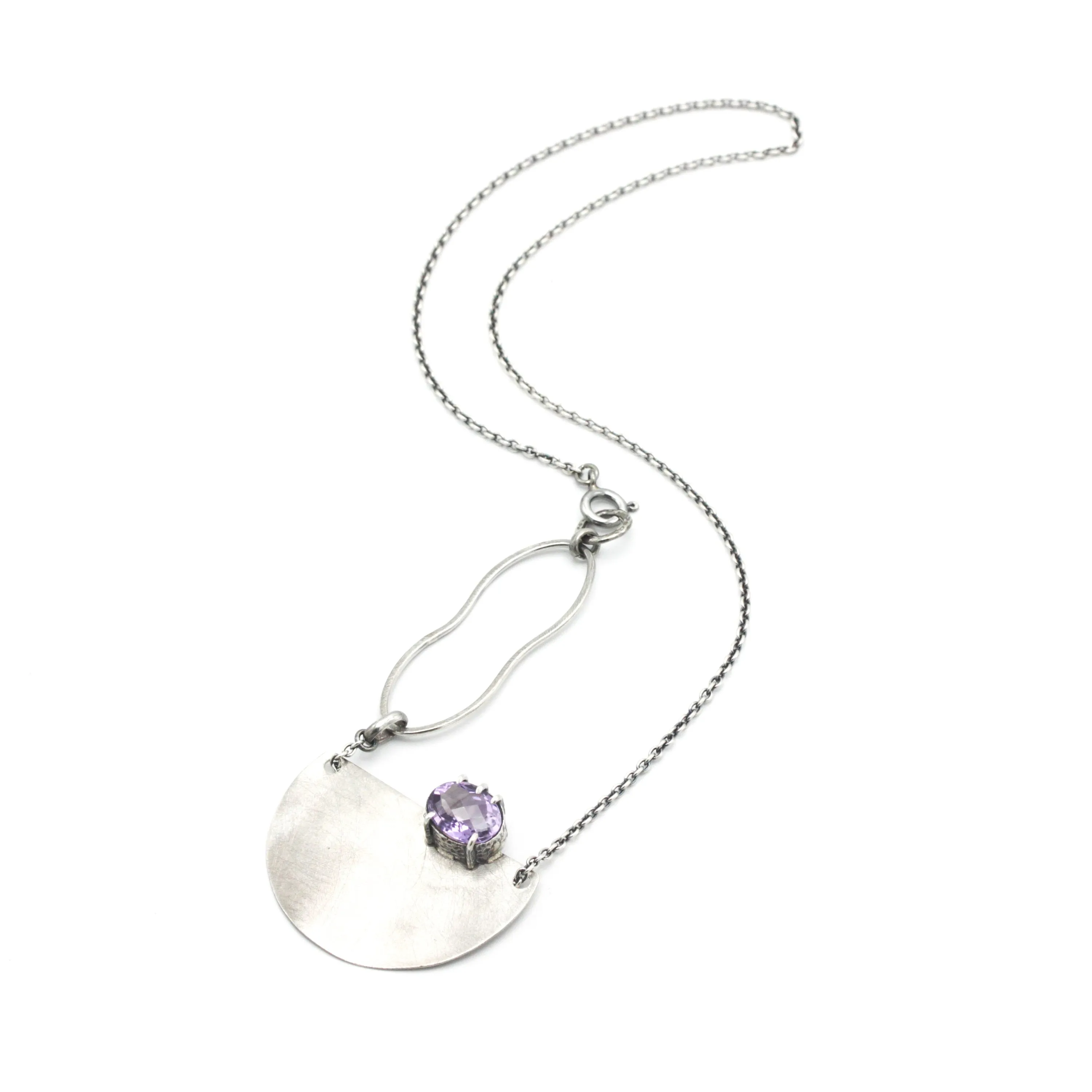 Oval Amethyst pendant necklace in silver bezel and prongs setting with silver semi-circle shape on sterling silver chain