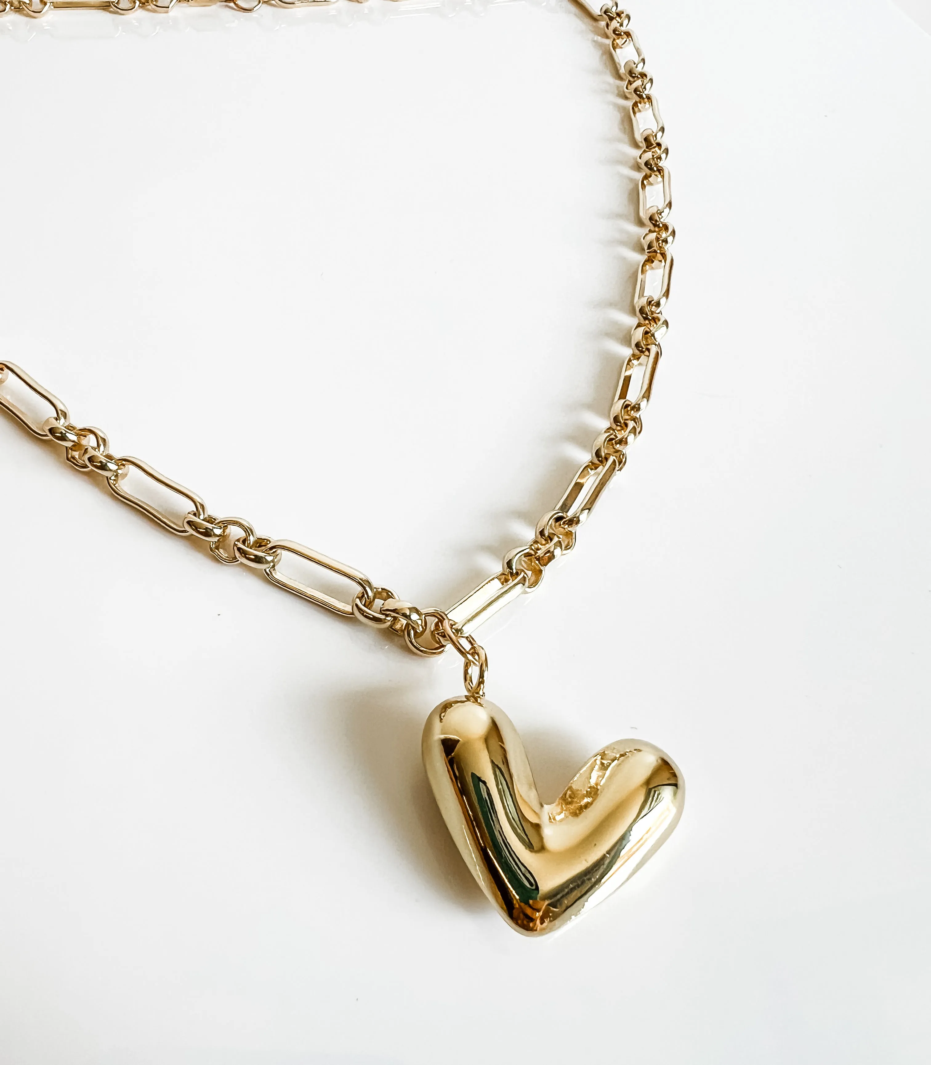 Penelope puffy heart charm