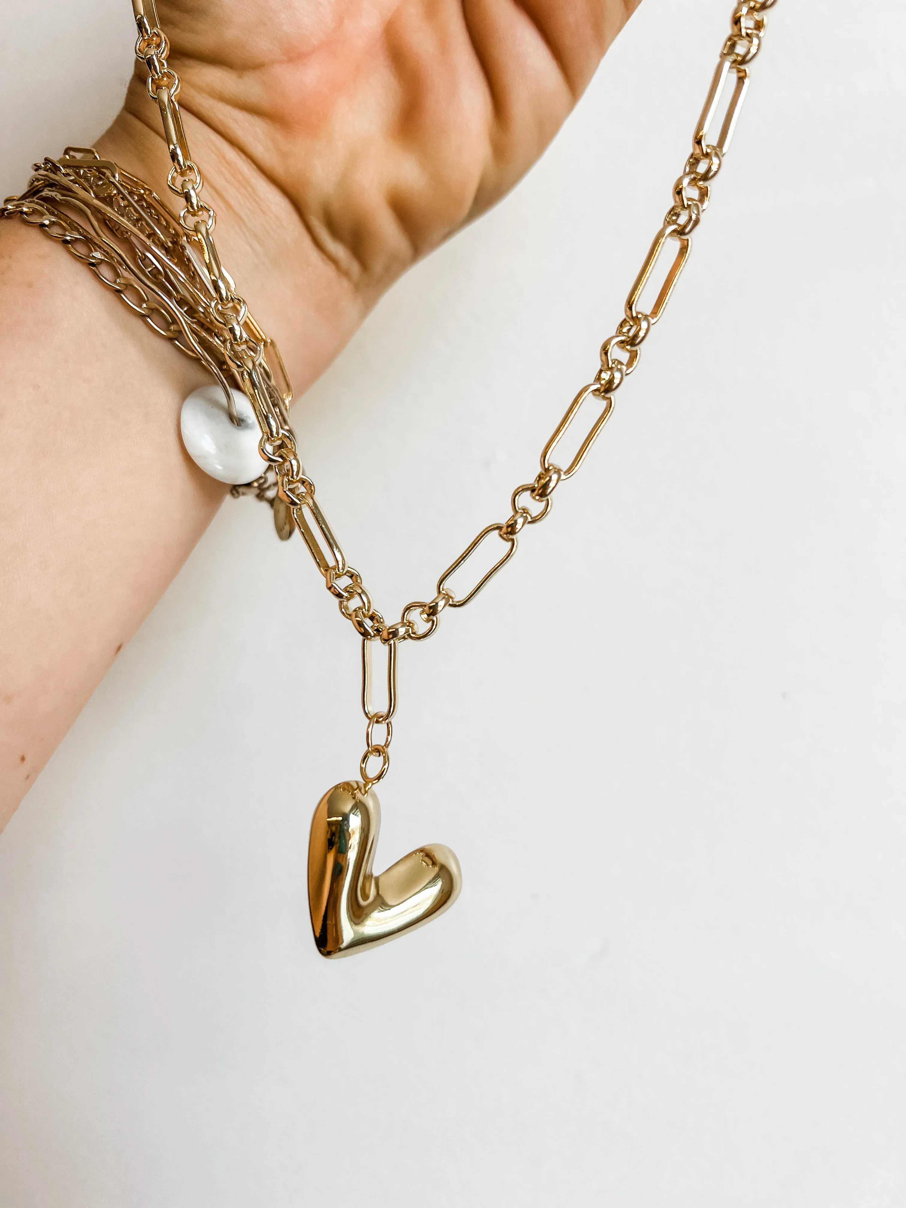 Penelope puffy heart charm