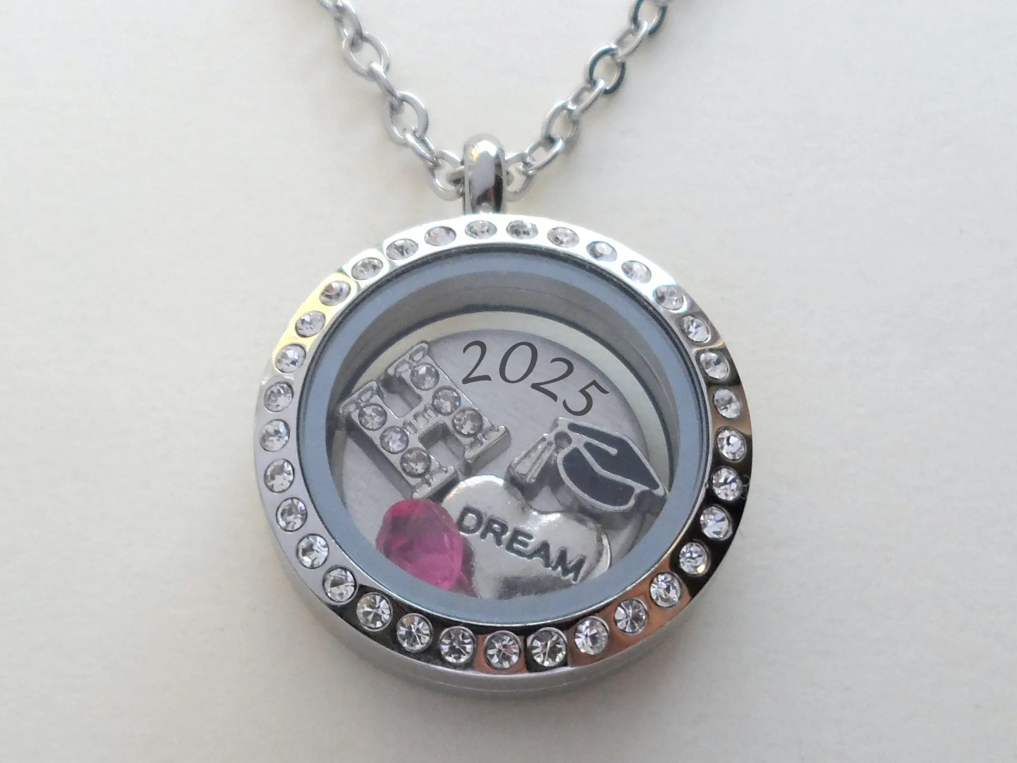 Personalized Graduation Floating Charm Locket Necklace with 2025 Disc, Graduate Cap, Dream Heart, Letter and Birthstone Charm - by Jewelry Everyday