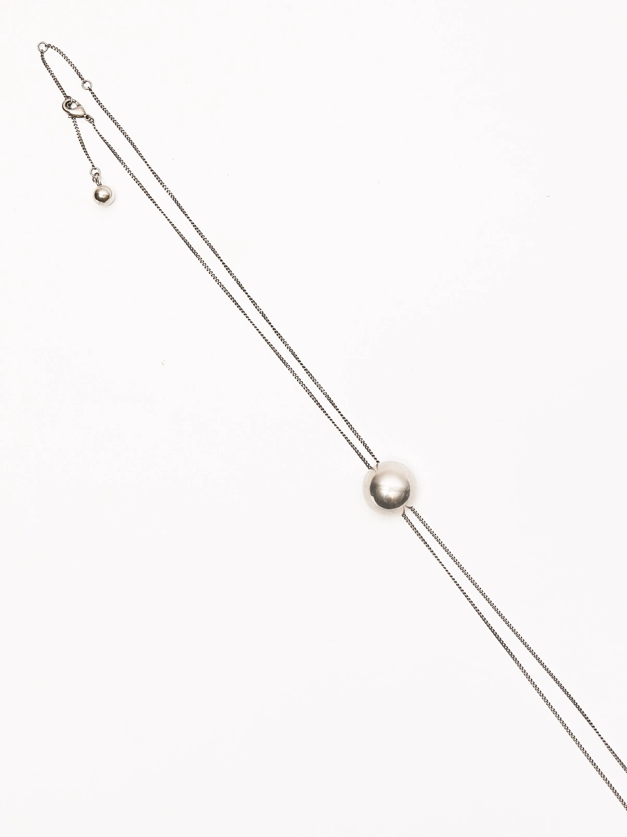 Silver Rattle Bolo Tie
