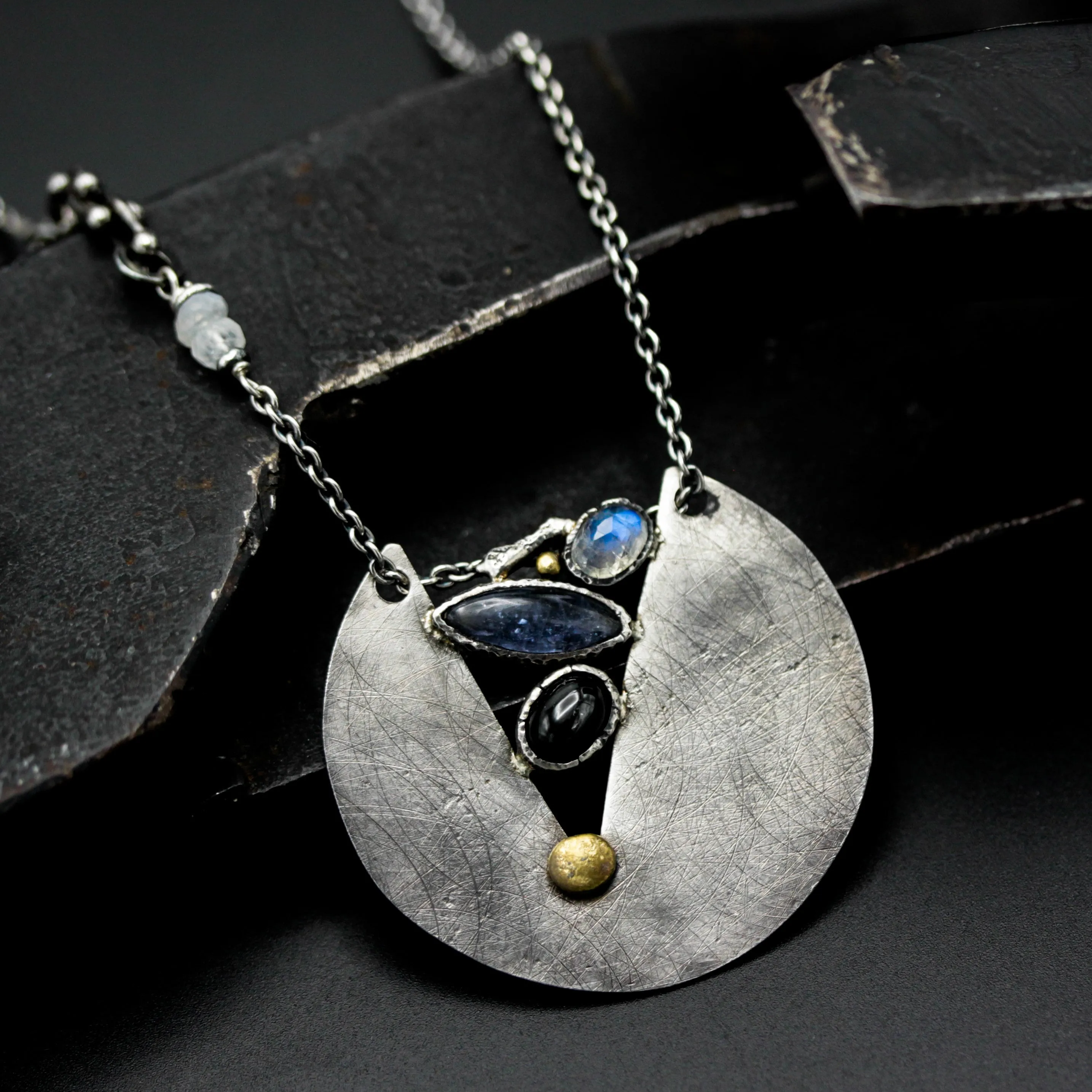 Sterling silver circle shape pendant necklace with moonstone, iolite and black star diposide on sterling silver chain