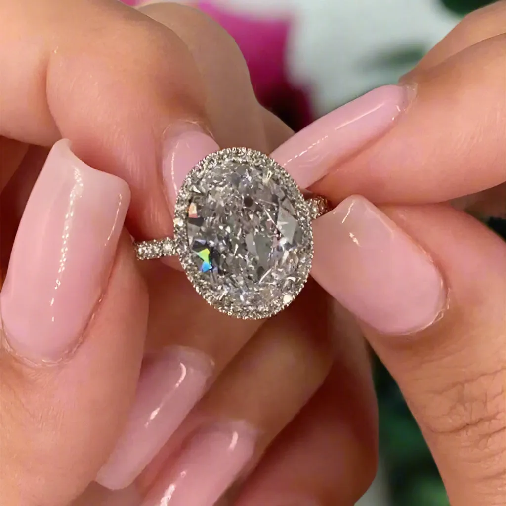 White Gold Halo Oval Cut Diamond Engagement Ring