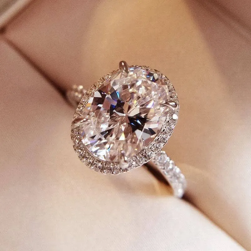 White Gold Halo Oval Cut Diamond Engagement Ring