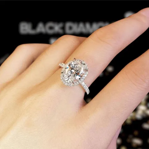 White Gold Halo Oval Cut Diamond Engagement Ring